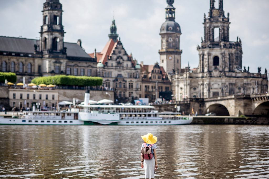 woman traveling in dresden city germany to find work abroad